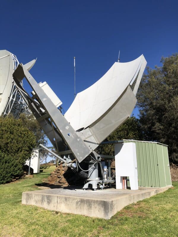 3.8m batwing satellite dish with a green shed next to it